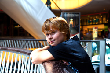 smiling boy inside a center