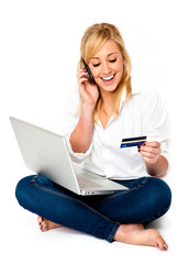 Shopping with laptop, mobile and credit card