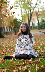 Beautiful young woman at fall