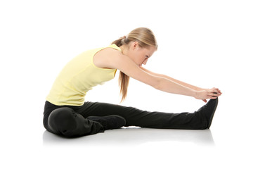 Fototapeta premium Young woman doing exercise