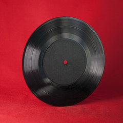 A black vinyl record