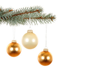 Branch with golden Christmas balls, isolated on white