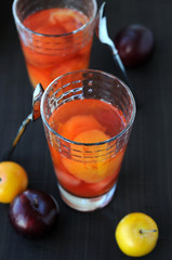 Vitaminized plum drink and plums