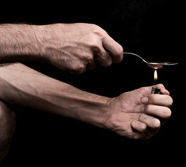 Drug Use. Spoon Lighter and Heroin