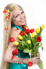 Naklejka na ściany i meble Smiling girl with Flowers