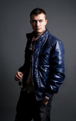 Fototapeta premium handsome young male model posing in studio