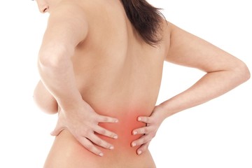 woman massaging pain back