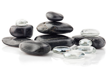 Natural black stones and transparent glass drops in pyramid