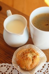 Coffee break with muffin and milk