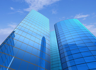 Obraz na płótnie Canvas High-altitude glass buildings with the sky and clouds