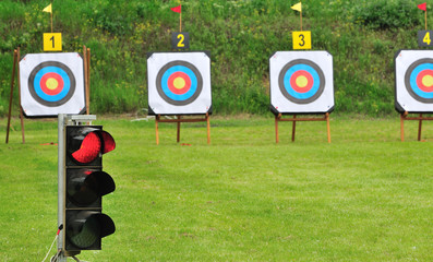 Red lamp and archery targets