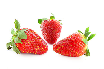 Few strawberries isolated on white
