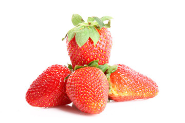 Few strawberries isolated on white
