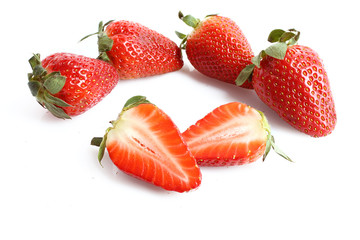 Few strawberries isolated on white