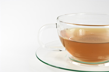 Glastasse mit Tee