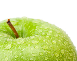 Green apple with water drops