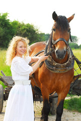 Obraz premium teenage girl with a horse