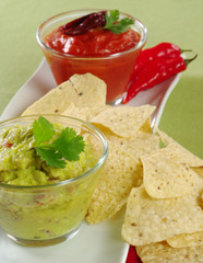 Guacamole with tacos and tomato-chili dip