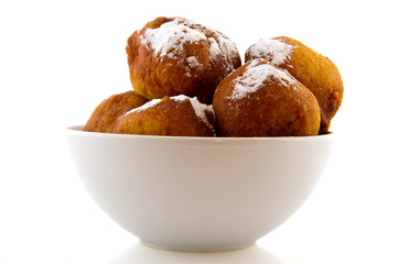 White bowl Dutch oliebollen