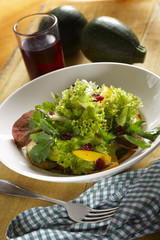 Green salad with different sort of pumpkin