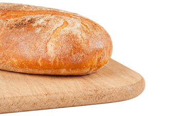 A loaf of rye bread on a cutting board isolated on white