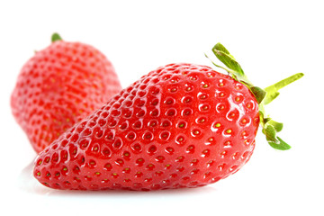 Two strawberries isolated on white