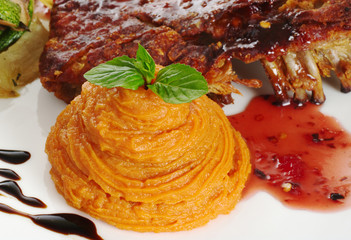 Mashed sweet potato with mint leaf and rib