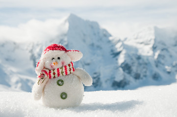 Happy snowman in mountain