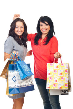 Happy women shoppers cheering