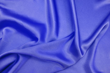 Drape background of blue silk