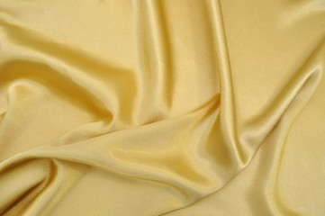 Drape background of golden silk