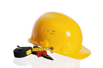 Tools and helmet of the builder, it is isolated on white