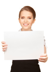 Fototapeta premium happy teenage girl with blank board