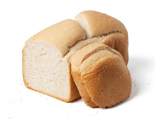 Bread loaf with slices isolated on white