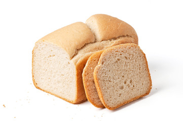 Bread loaf with slices isolated on white