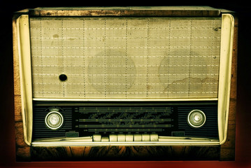 Old radio isolated on a dark background