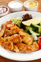 Grilled meat and vegetables