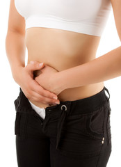 Fototapeta premium Woman massaging pain stomach isolated on white