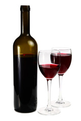 bottle with red wine and glass