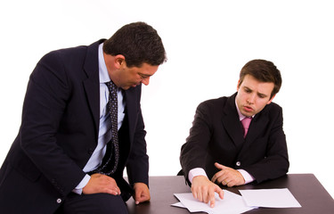 business team working at a desk, isolated on white