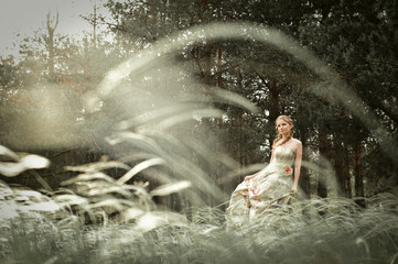 Portrait of romantic woman in fairy forest