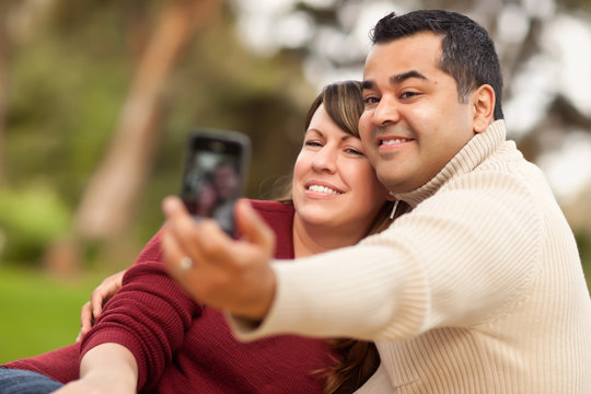Attractive Mixed Race Couple Taking Self Portraits