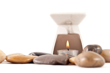 Lit Candle Inside Oil Incense Burner