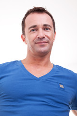Obraz premium Portrait of a handsome middle-age man smiling
