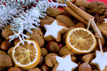 closeup of star-shaped cinnamon biscuit with decoration