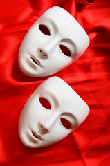 Theatre concept with the white plastic masks