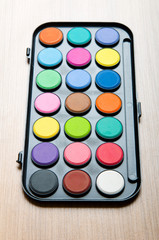 Art concept with painters palette and paint brush