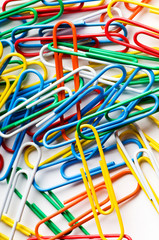 Close up of many colourful paper clips