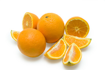 Slices of peeled orange on white background