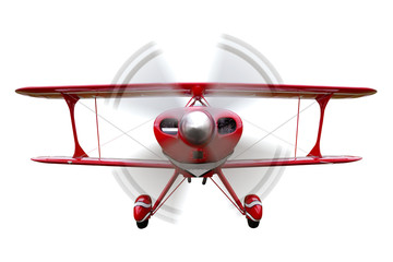 Red biplane flying isolated